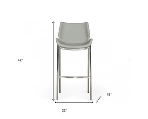 Homeroots Set Of Two 30" Gray And Silver Faux Leather And Steel Low Back Bar Height Bar Chairs   473884