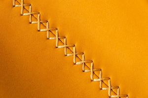 Homeroots Set Of Two 30" Orange And Silver Faux Leather And Steel Low Back Bar Height Bar Chairs   473886