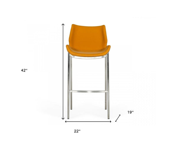 Homeroots Set Of Two 30" Orange And Silver Faux Leather And Steel Low Back Bar Height Bar Chairs   473886