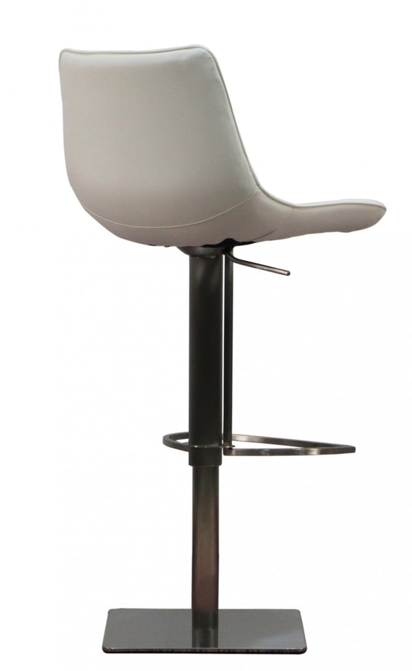 Homeroots 29" White And Silver Faux Leather And Stainless Steel Bar Height Swivel Bar Chair   473898