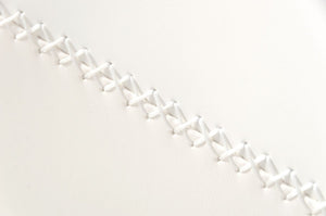 Homeroots 31" White And Silver Faux Leather And Steel Swivel Low Back Bar Height Bar Chair   473903