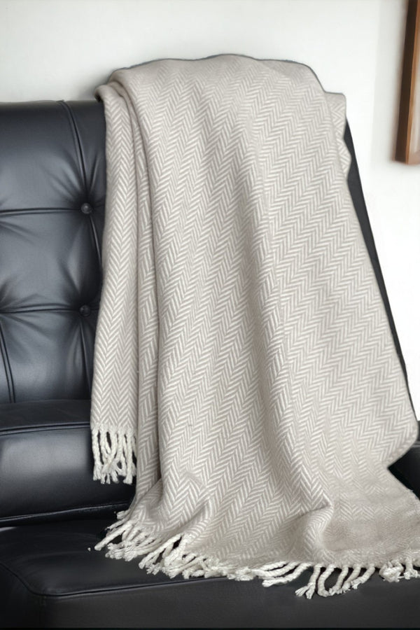 HomeRoots 70" Plush Cotton Blend Woven Herringbone Throw Blanket with Tasseled Edges for Cozy Comfort Gray, White 474025