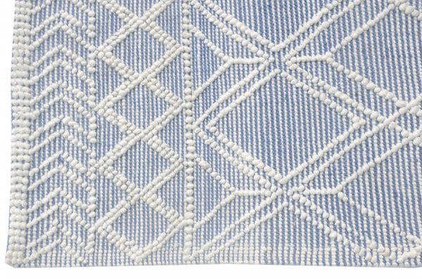HomeRoots 9' Blue Ivory Tribal Geometric Area Rug - Plush, Durable, and Stain-Resistant for Modern Spaces 9' X 13' 475237