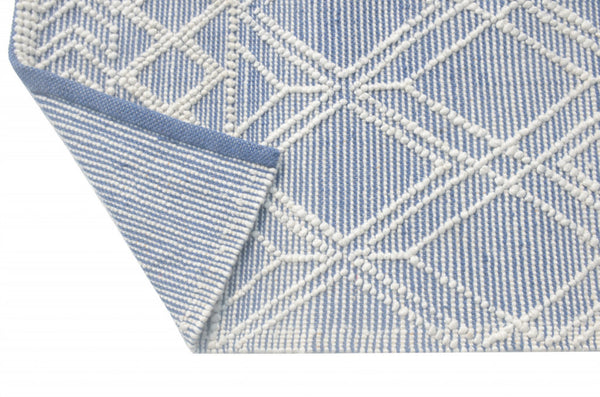 HomeRoots 9' Blue Ivory Tribal Geometric Area Rug - Plush, Durable, and Stain-Resistant for Modern Spaces 9' X 13' 475237