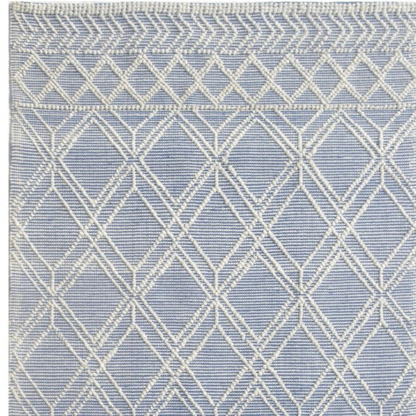 HomeRoots 9' Blue Ivory Tribal Geometric Area Rug - Plush, Durable, and Stain-Resistant for Modern Spaces 9' X 13' 475237