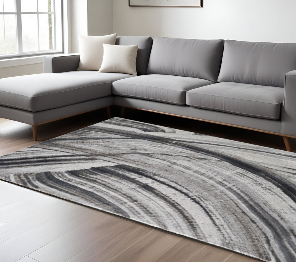 HomeRoots 3' Gray and Ivory Abstract Area Rug – Stylish Modern Design, Durable, Easy-Care for Family Spaces 7' X 10' 475249
