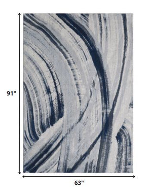 Homeroots 5' X 8' Ivory And Blue Abstract Area Rug  Polypropylene 475253