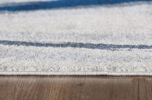 Homeroots 5' X 8' Ivory And Blue Abstract Area Rug  Polypropylene 475253