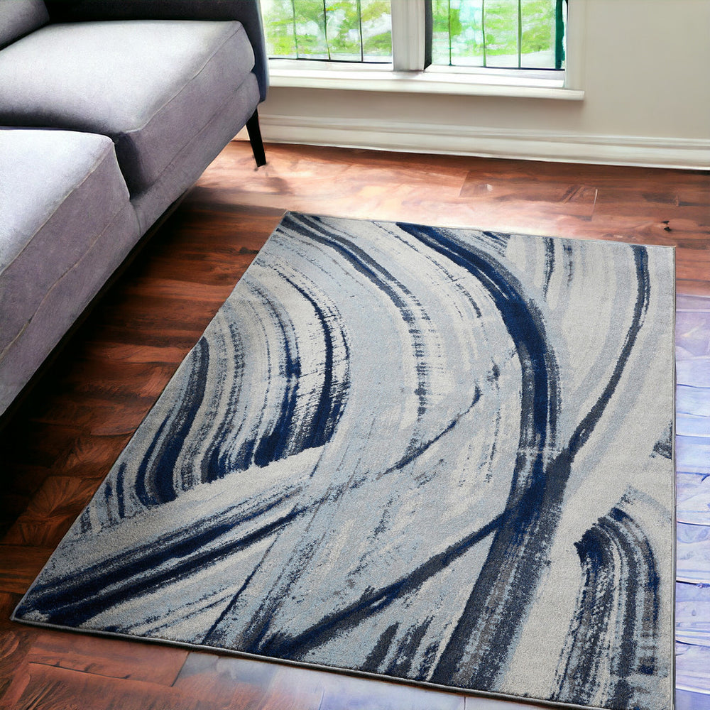 Homeroots 5' X 8' Ivory And Blue Abstract Area Rug  Polypropylene 475253