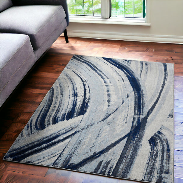 Homeroots 5' X 8' Ivory And Blue Abstract Area Rug  Polypropylene 475253