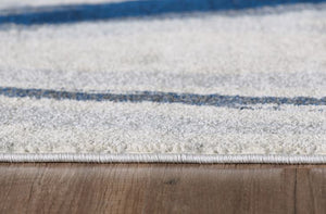 Homeroots 7' X 10' Ivory And Blue Abstract Area Rug  Polypropylene 475254