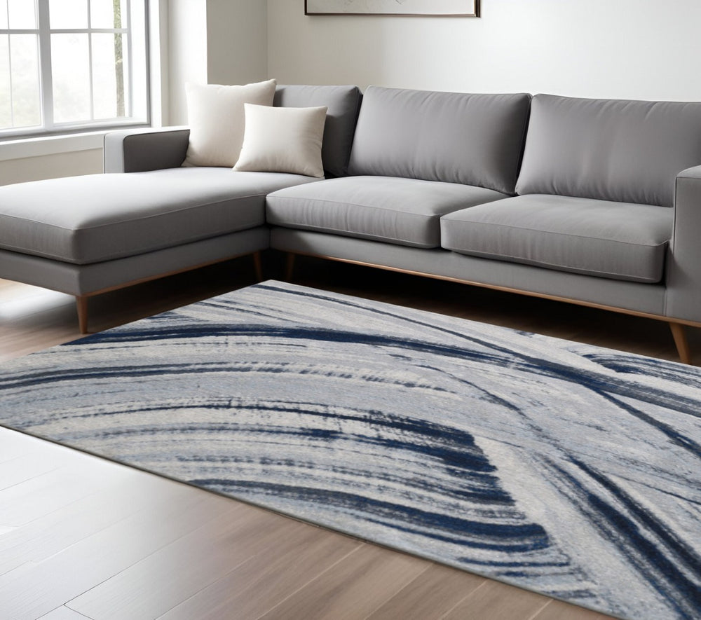 HomeRoots 5' Ivory and Blue Abstract Area Rug – Modern Design for Living Rooms, Durable & Stain-Resistant 8' X 11' 475255