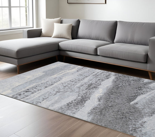 HomeRoots 10' Blue Gray Abstract Mist Area Rug - Contemporary Design for Modern Living Spaces, Durable Comfort 10' X 13' 475266