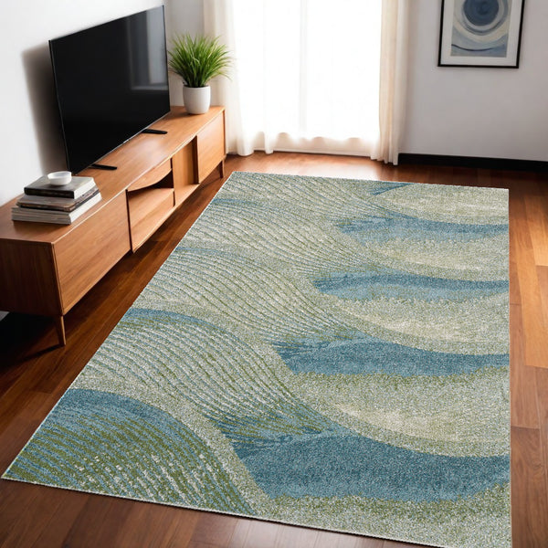 Homeroots 5' X 8' Blue And Beige Abstract Waves Area Rug  Polypropylene 475268