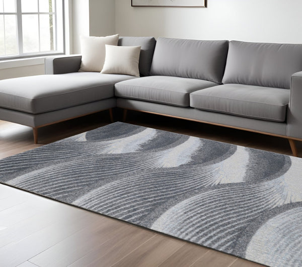 HomeRoots 5' Blue and Gray Abstract Area Rug - Stylish, Durable, Stain-Resistant for Modern Living Spaces 7' X 10' 475274