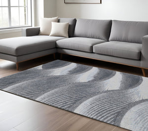 HomeRoots 5' Blue and Gray Abstract Area Rug - Stylish, Durable, Stain-Resistant for Modern Living Spaces 8' X 11' 475275