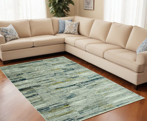 Homeroots 8' X 11' Ivory And Blue Abstract Area Rug  Polyester 475303