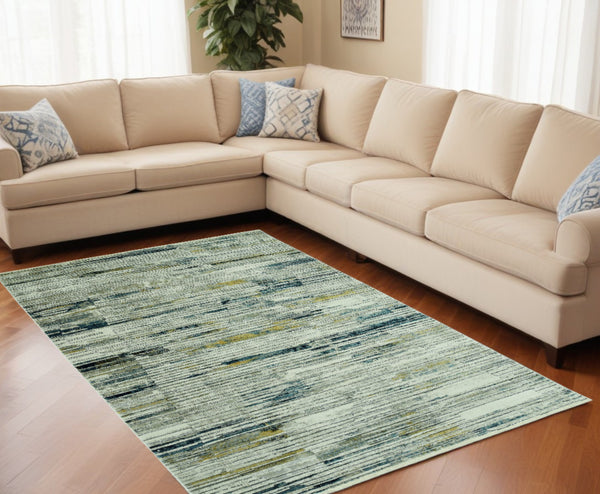 Homeroots 8' X 11' Ivory And Blue Abstract Area Rug  Polyester 475303
