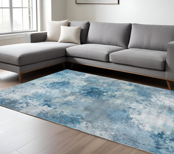 HomeRoots 5' Blue and Ivory Abstract Area Rug - Contemporary Design, Durable Polyester, Perfect for Any Room 6' X 9' 475316