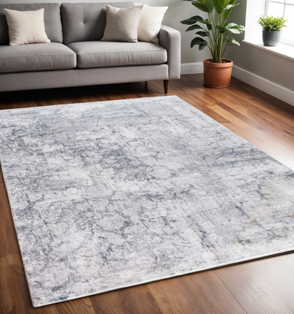 HomeRoots 5' Gray and Ivory Abstract Area Rug - Stylish, Durable, and Contemporary Design for Any Space 5' X 8' 475331