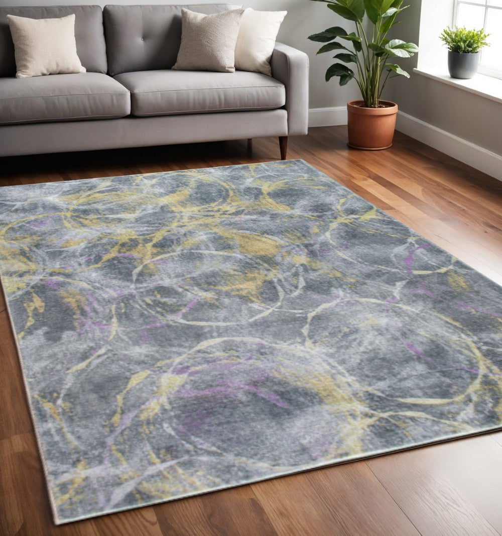 HomeRoots 5' Contemporary Abstract Area Rug in Gray, Yellow, and Purple - Stylish Durability for Any Space 5' X 8' 475335