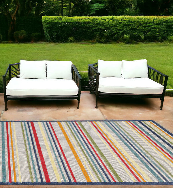 Homeroots 7' X 9' Ivory And Blue Striped Stain Resistant Indoor Outdoor Area Rug  Uv,Treated Polypropylene 475535