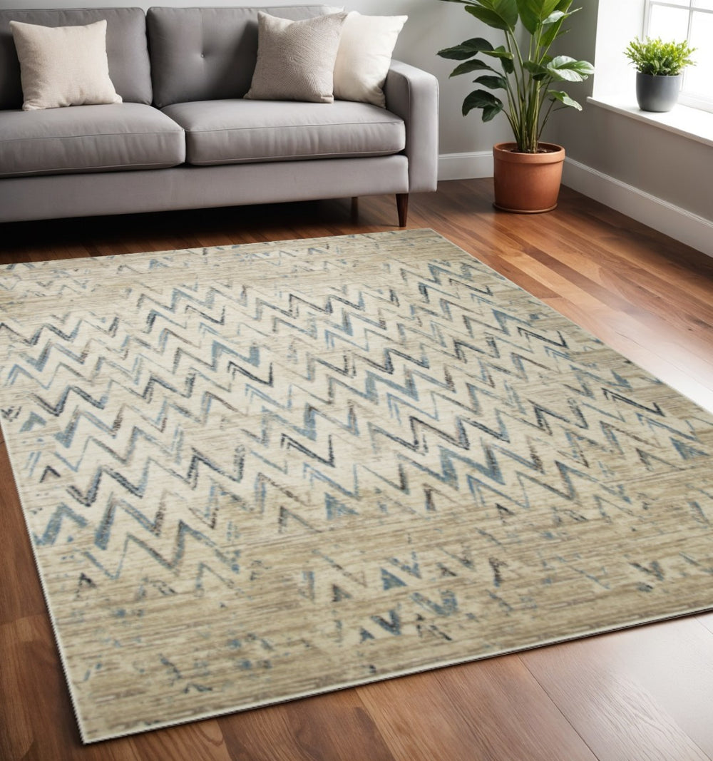 HomeRoots 5' Ivory and Blue Chevron Area Rug - Stylish, Durable Design Perfect for Family Rooms and High Traffic Areas 5' X 8' 475576