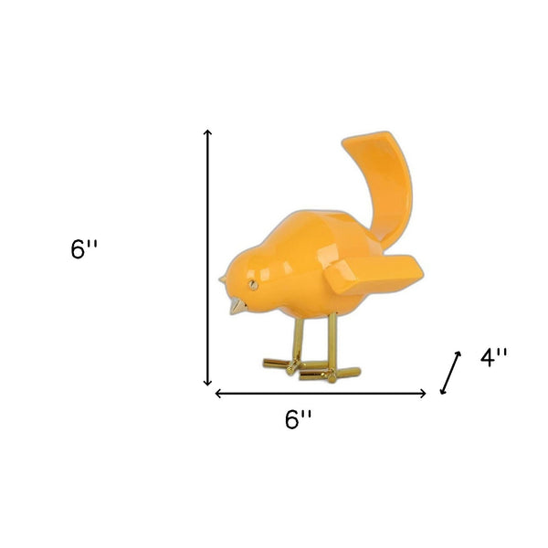 Homeroots 6" Yellow Ceramic Hand Painted Tabletop Sculpture  Ceramic 476366