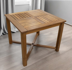 HomeRoots 36" Brown Solid Wood Trestle Dining Table - Elegant Teak Centerpiece for Indoor & Outdoor Spaces 476415