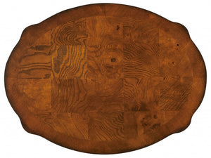 Homeroots 26" Medium Brown And Umber Solid And Manufactured Wood Oval End Table With Two Drawers And Shelf   476430