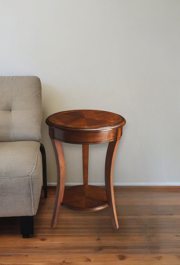 HomeRoots 26" Rustic Round End Table with Distressed Olive Ash Top & Convenient Shelf for Small Spaces 476437