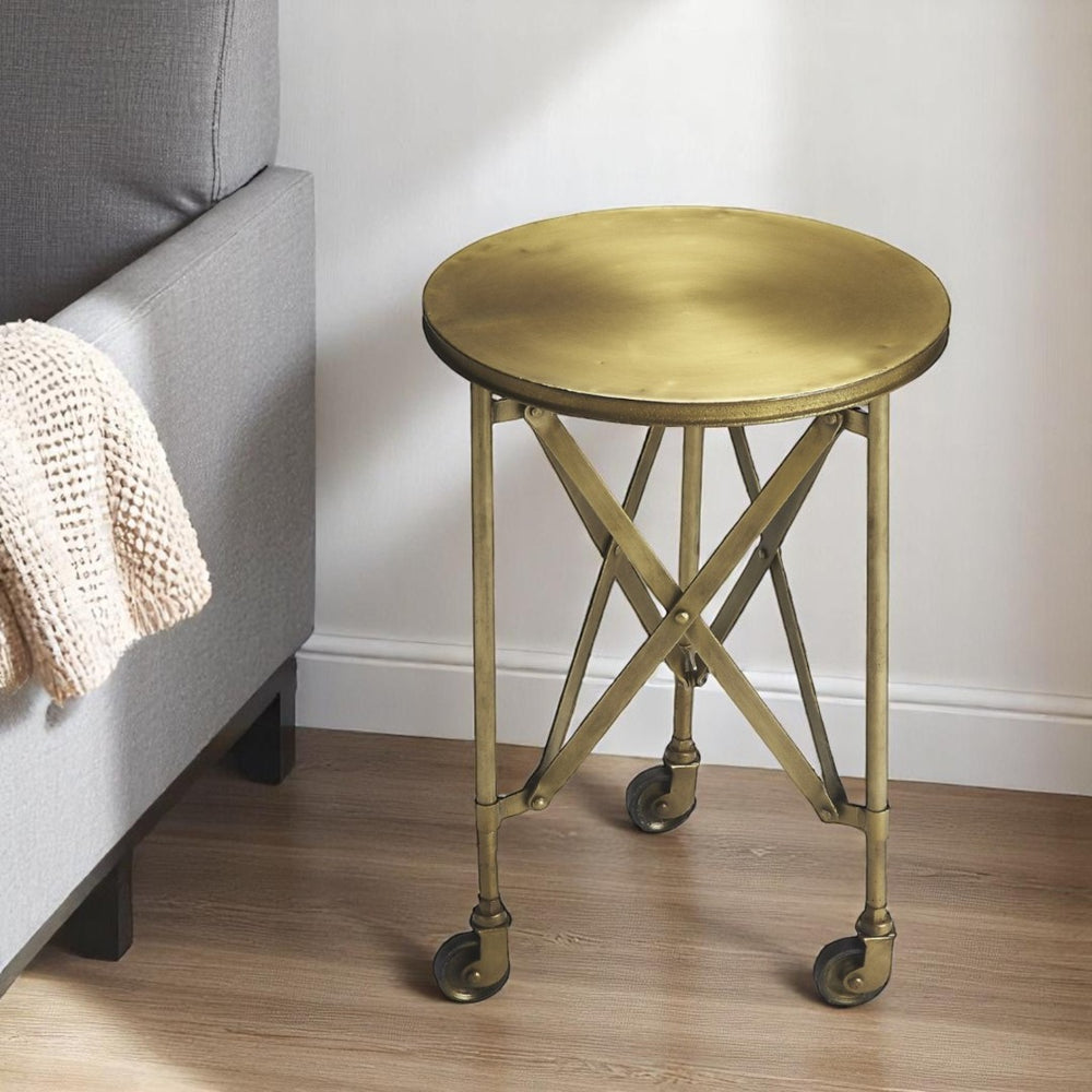 HomeRoots 24" Antiqued Gold Iron Round Rolling End Table – Chic, Compact, and Versatile for Any Space 476444