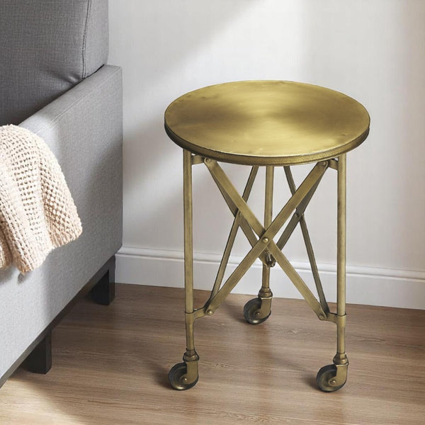 HomeRoots 24" Antiqued Gold Iron Round Rolling End Table – Chic, Compact, and Versatile for Any Space 476444