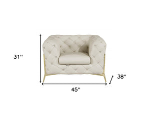Homeroots 45" Beige And Gold Italian Leather Tufted Chesterfield Chair Beige  476512