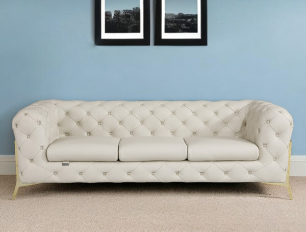 Homeroots 93" Beige Italian Leather Chesterfield Sofa With Silver Legs Beige  476528