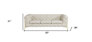 Homeroots 93" Beige Italian Leather Chesterfield Sofa With Silver Legs Beige  476528