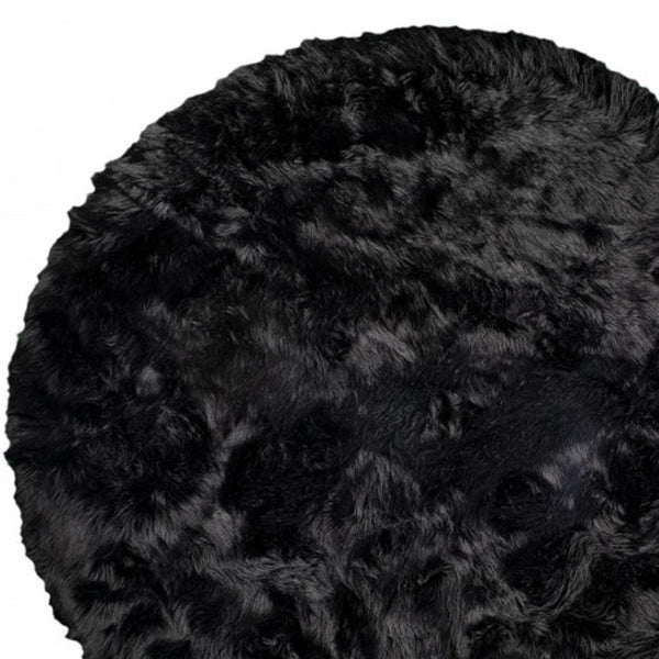 HomeRoots 6' Round Faux Fur Area Rug - Plush, Washable, Non-Skid Design for Cozy, Modern Interiors Black 476663