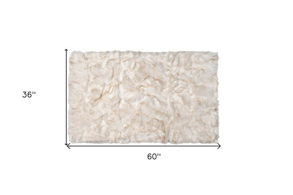 HomeRoots 3' X 5' Ombre Faux Fur Area Rug – Luxurious, Washable, Non-Skid Design for Cozy Modern Spaces Tan 476668