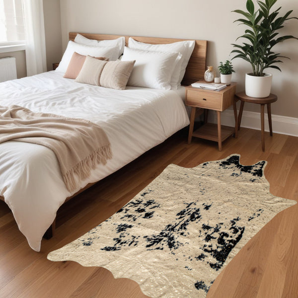 Homeroots 4' X 5' Off White Black And Gold Faux Cowhide Non Skid Area Rug  Faux Cowhide 476679