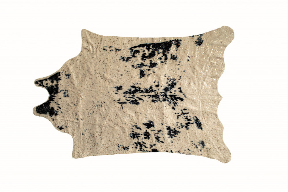 Homeroots 5' X 8' Off White Black And Gold Faux Cowhide Washable Area Rug  Acrylic 476682