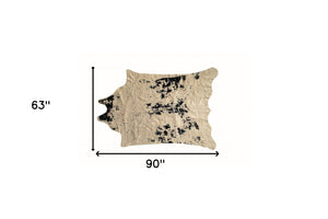 Homeroots 5' X 8' Off White Black And Gold Faux Cowhide Washable Area Rug  Acrylic 476682