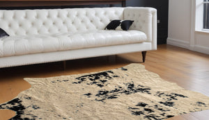 Homeroots 5' X 8' Off White Black And Gold Faux Cowhide Washable Area Rug  Acrylic 476682