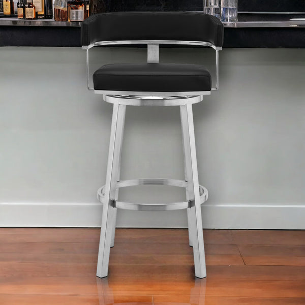 Homeroots 30" Black And Silver Faux Leather And Iron Swivel Low Back Bar Height Bar Chair   476732