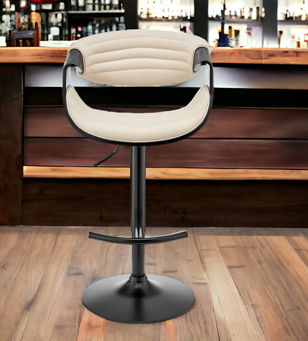 Homeroots Cream And Black Faux Leather Iron Swivel Low Back Adjustable Height Bar Chair   476779