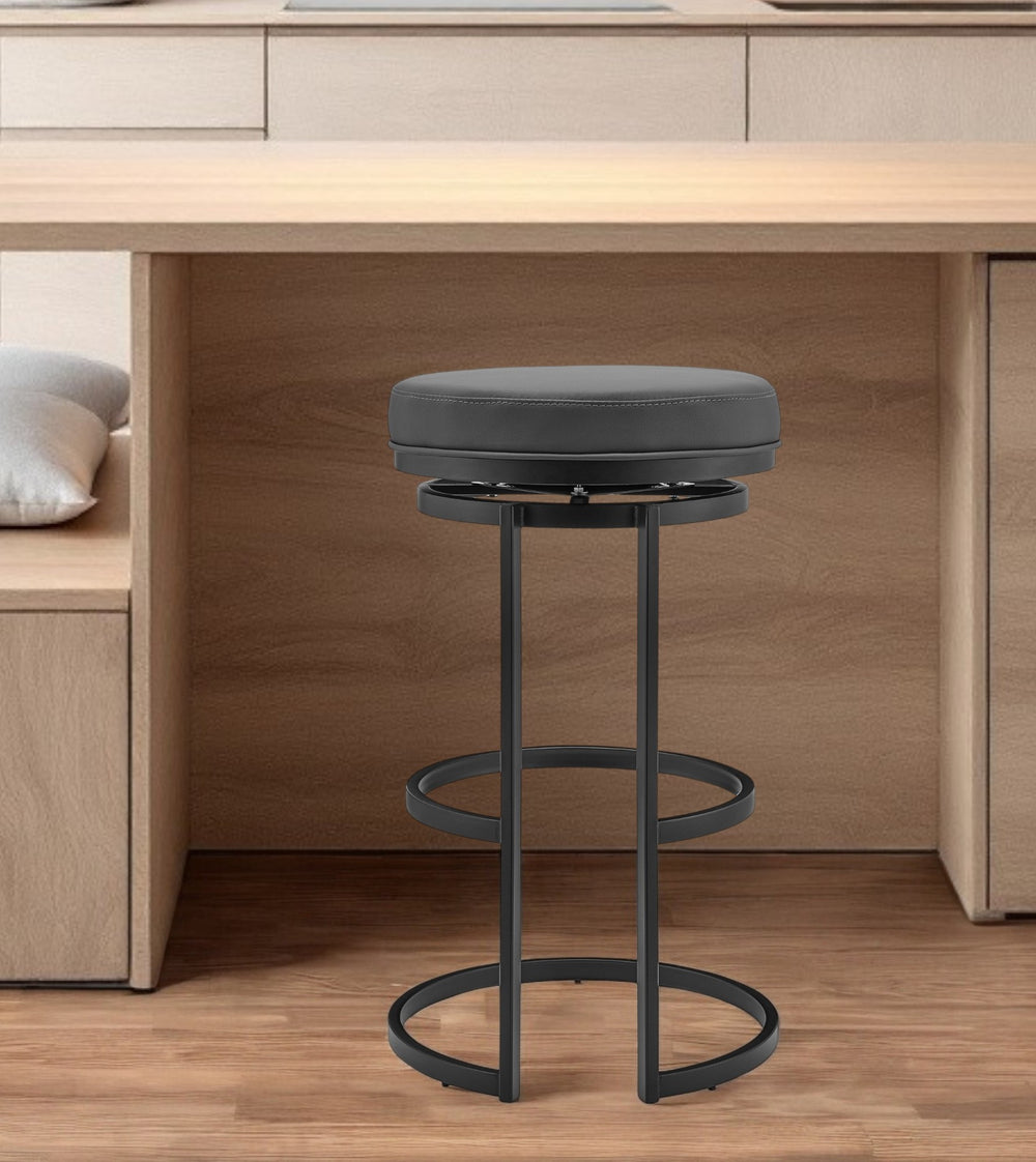 Homeroots 26" Gray And Black Faux Leather And Iron Swivel Backless Counter Height Bar Chair   476994