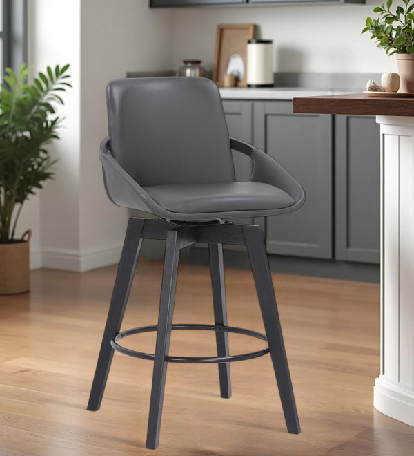 Homeroots 27" Gray And Black Faux Leather Low Back Bar Height Swivel Bar Chair   477038