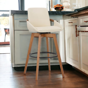 Homeroots 31" Cream And Black Iron Swivel Bar Height Bar Chair   477040