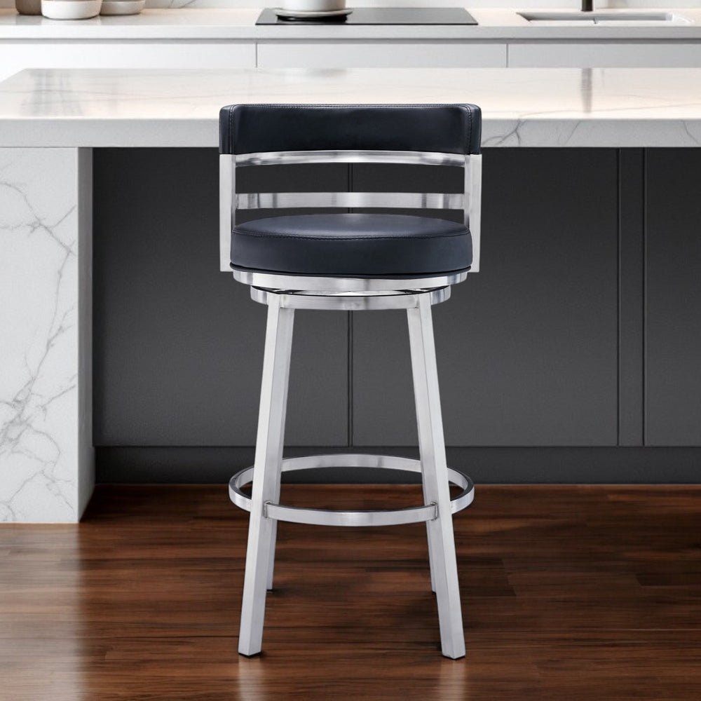 Homeroots 30" Black And Silver Faux Leather And Iron Swivel Low Back Bar Height Bar Chair   477141