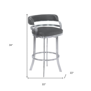 Homeroots 26" Gray And Silver Faux Leather And Iron Swivel Low Back Counter Height Bar Chair   477208