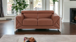 HomeRoots 69" Faux Leather Love Seat - Contemporary Comfort with Pillow-Top Arms for Modern Living Spaces ORANGE 477561